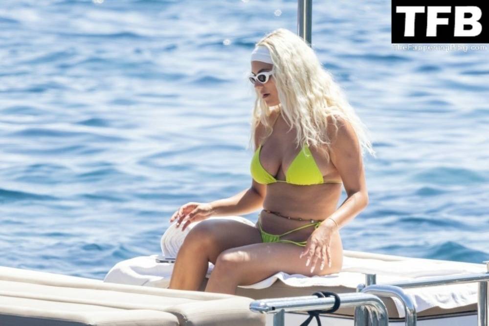 Kelsey Calemine Rocks a Yellow Bikini Aboard a Yacht on a Summer Break in Nerano - #17