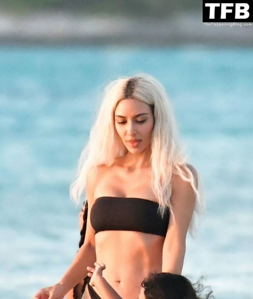 Kim Kardashian Enjoys a Sweet Moment on the Beach During a Family Vacation to Turks and Caicos - #8