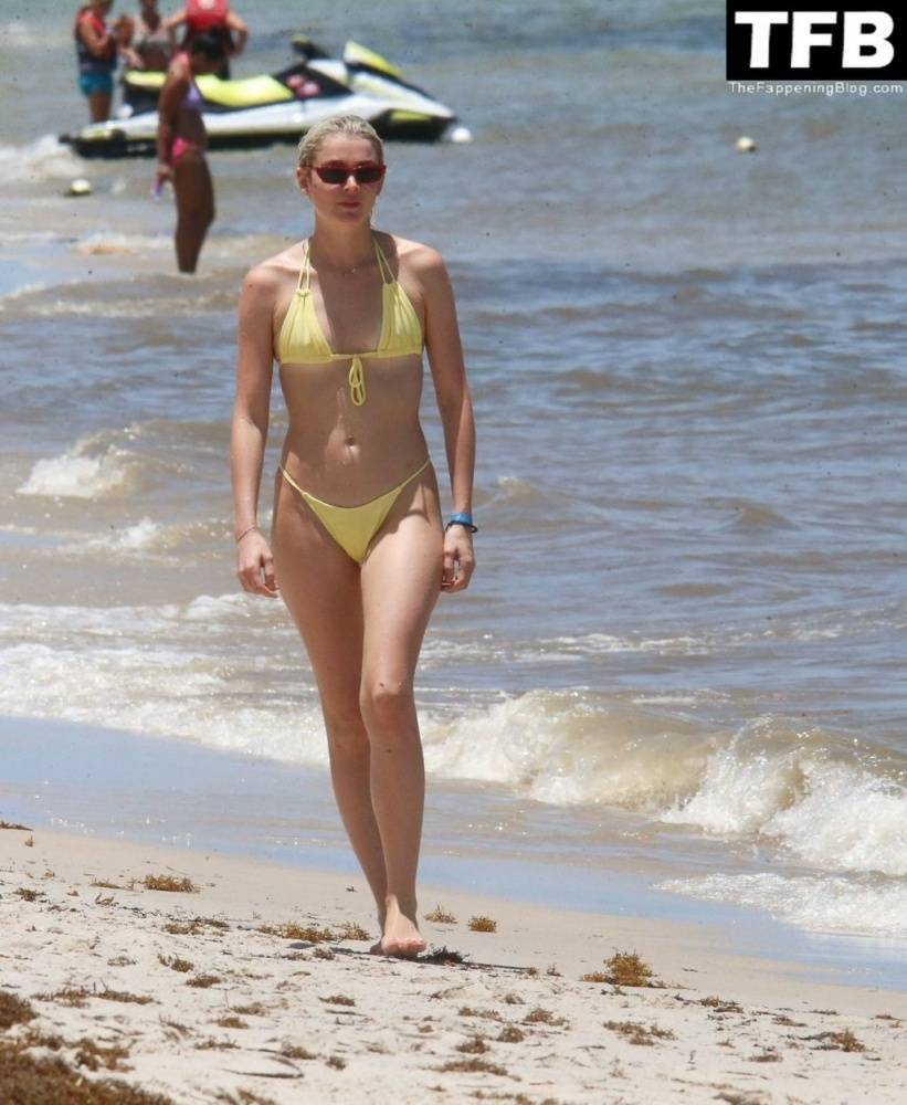 Allie Teilz Shows Off Her Sexy Figure in a Yellow Bikini - #8