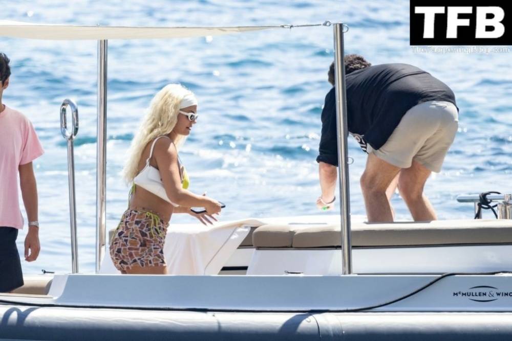 Kelsey Calemine Rocks a Yellow Bikini Aboard a Yacht on a Summer Break in Nerano - #1