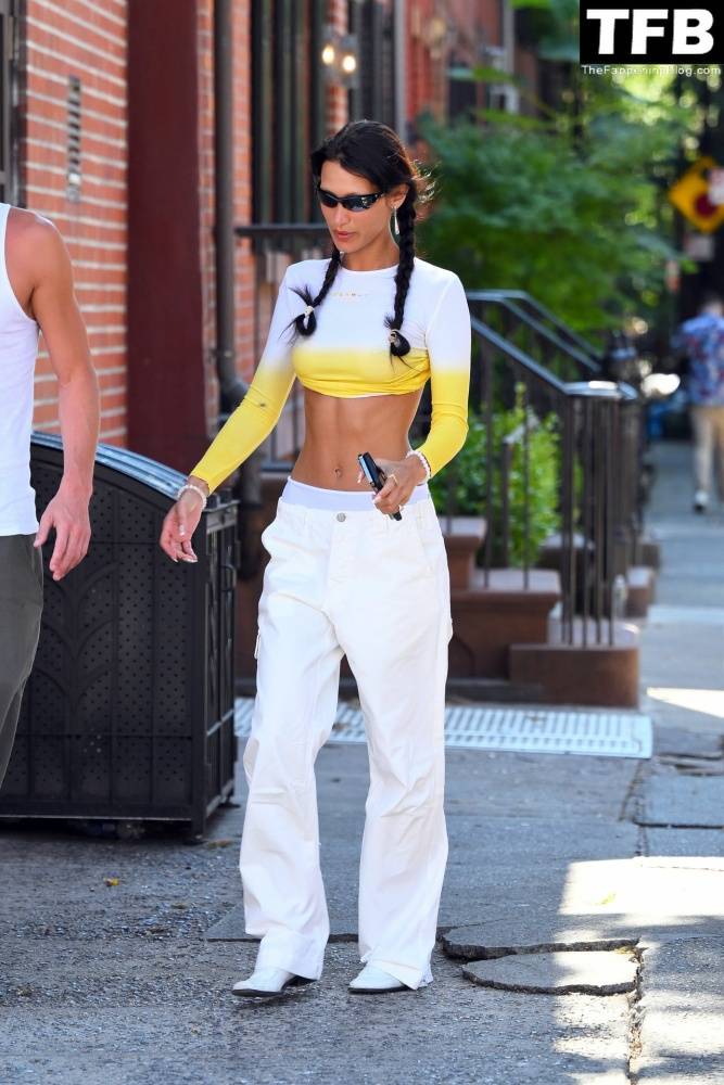 Braless Bella Hadid Steps Out with Marc Kalman for a Walk in NYC - #35