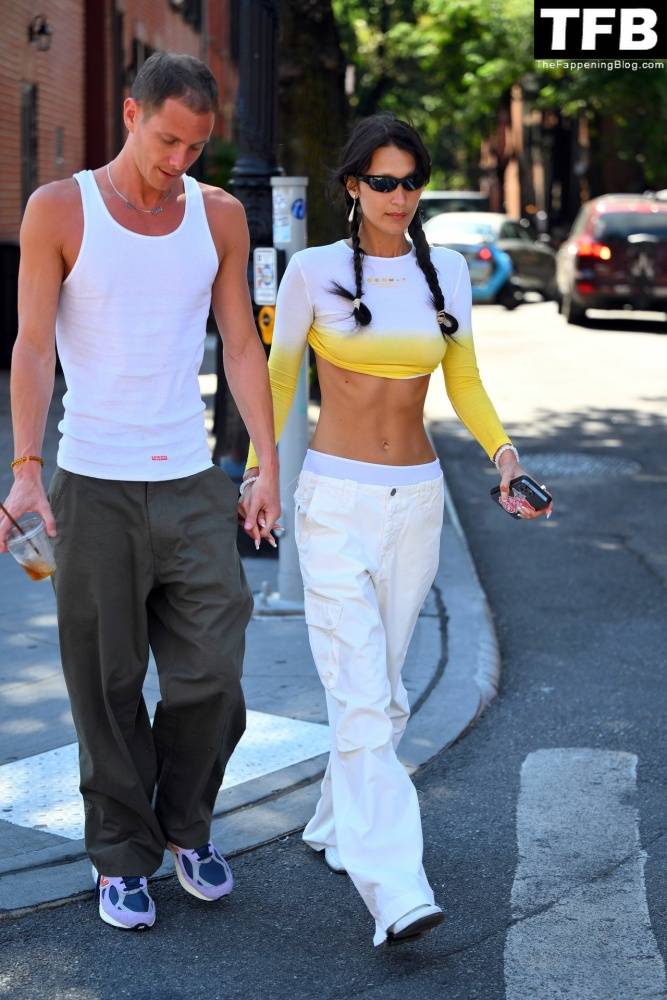 Braless Bella Hadid Steps Out with Marc Kalman for a Walk in NYC - #26