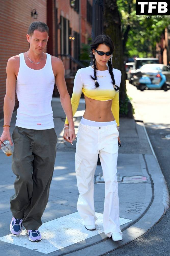 Braless Bella Hadid Steps Out with Marc Kalman for a Walk in NYC - #46