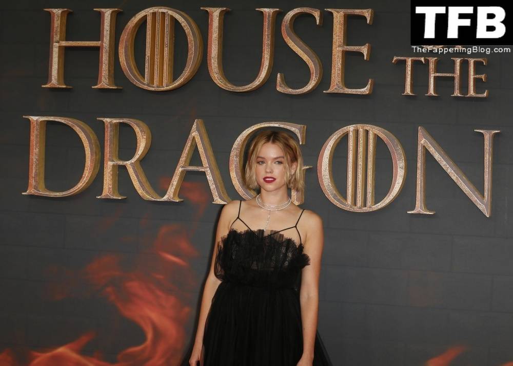 Milly Alcock Poses in a Black Dress at the HBO 19s 1CHouse of the Dragon 1D Premiere in London - #15