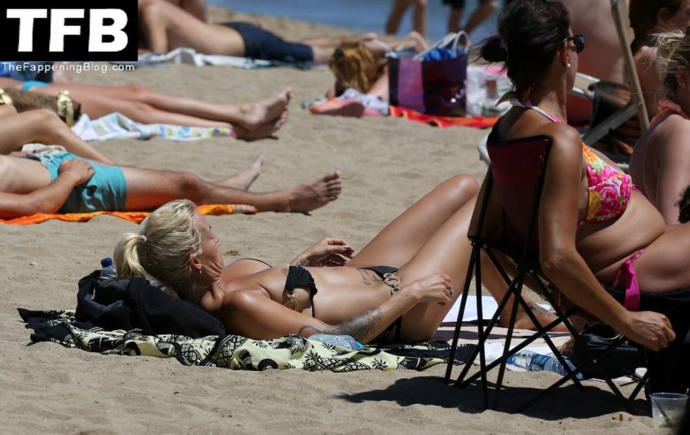 Sarah Connor Flashes Her Nude Breasts on the Beach - #5