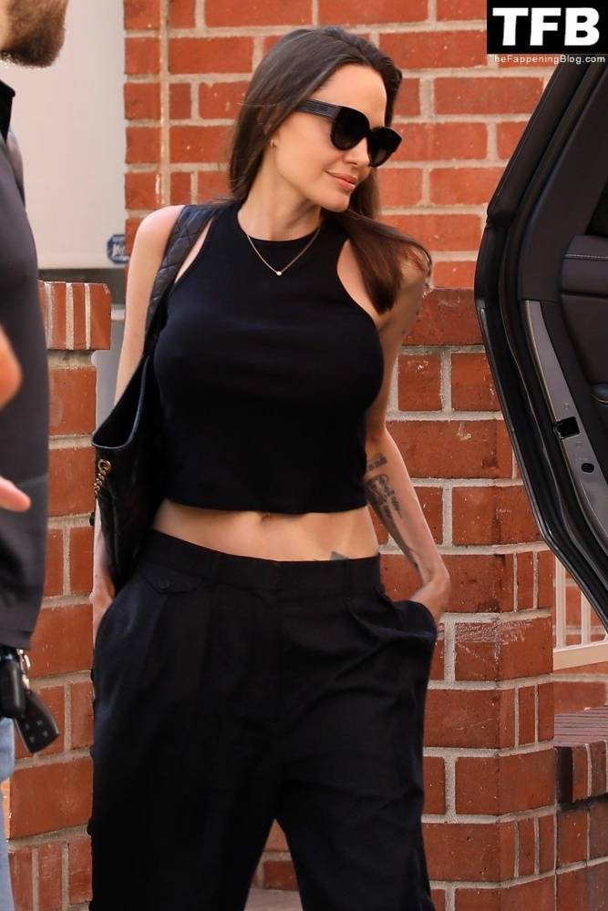 Angelina Jolie Shows Off Her Tight Tummy Leaving an Office Building - #11
