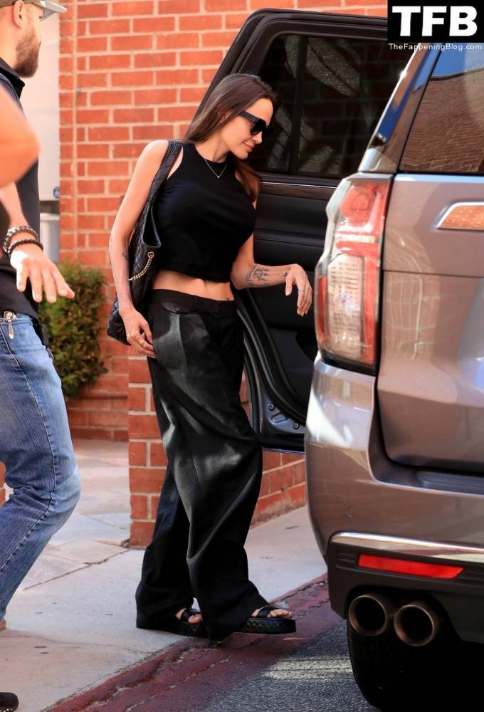 Angelina Jolie Shows Off Her Tight Tummy Leaving an Office Building - #4
