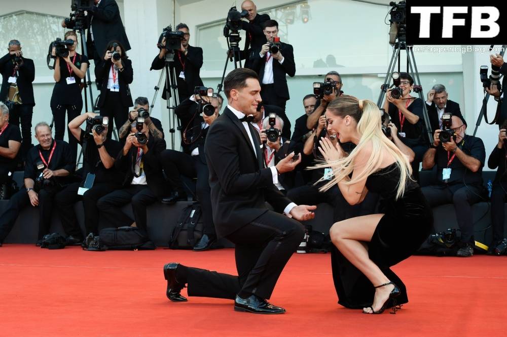 Alessandro Basciano Proposes to Sophie Codegoni During 1CThe Son 1D Red Carpet at the 79th Venice International Film Festival - #17