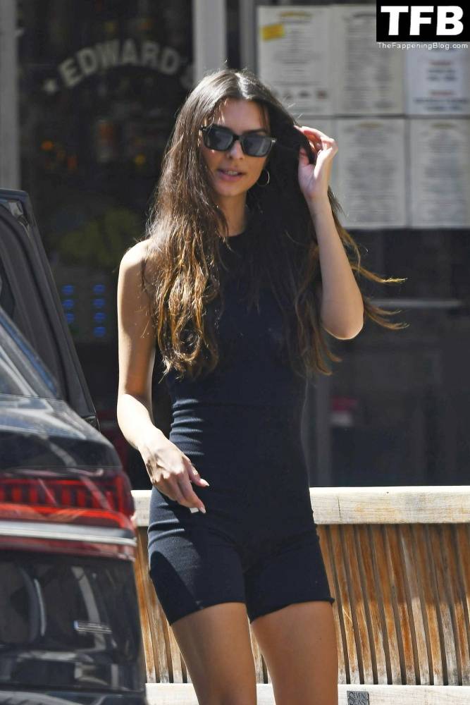 Emily Ratajkowski is Seen Wearing a Black Jumpsuit And Canvas Nike Sneakers in NYC - #37